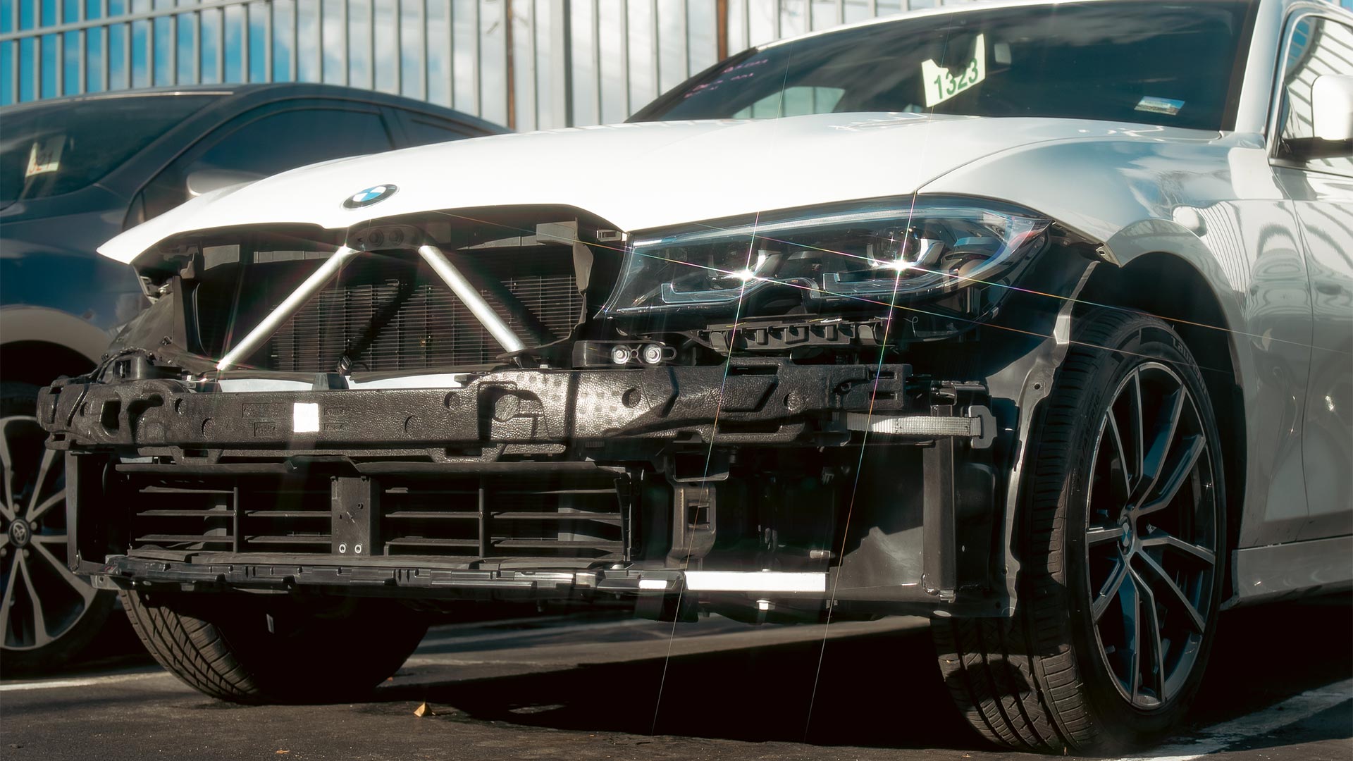 An image of a 3-series BMW with front bumper damage